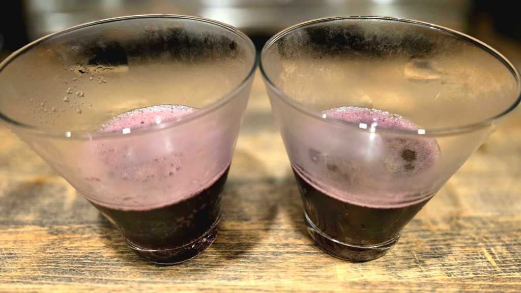 Two glasses of red sparkling wine.