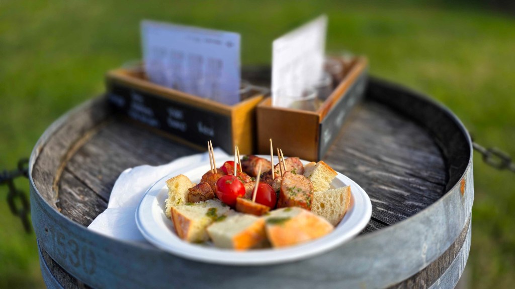 A plate of bread and sausages.